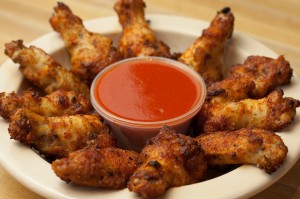 Brand New - Smokin Dry Rub Wings - We've worked to improve our cooking process, creating a better texture, PLUS we're adding this all new flavor featuring an herby dry rub seasoning, delicious all on its own or dipped in your choice of sauce (ranch, bleu cheese, honey mustard, or creamy sriracha) - Look for free samples at Craft Beer Month Events!